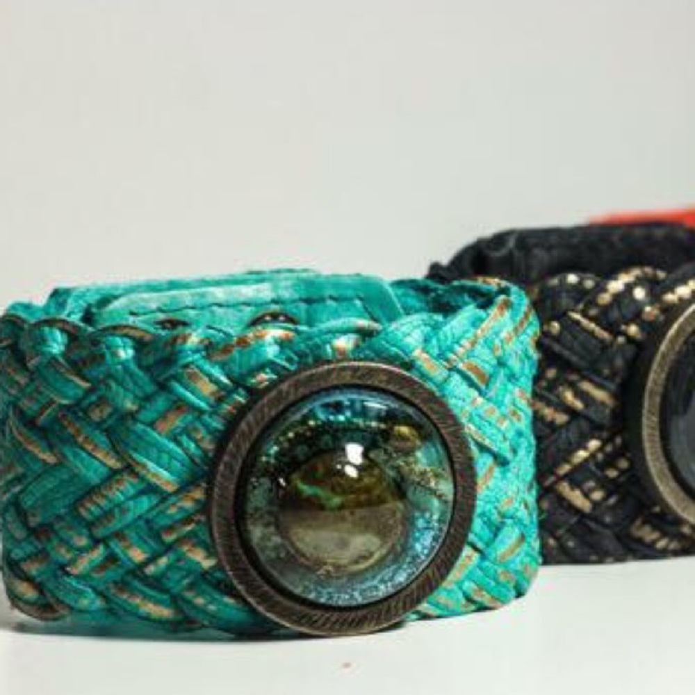 Leather banded, braided bracelet with blown glass